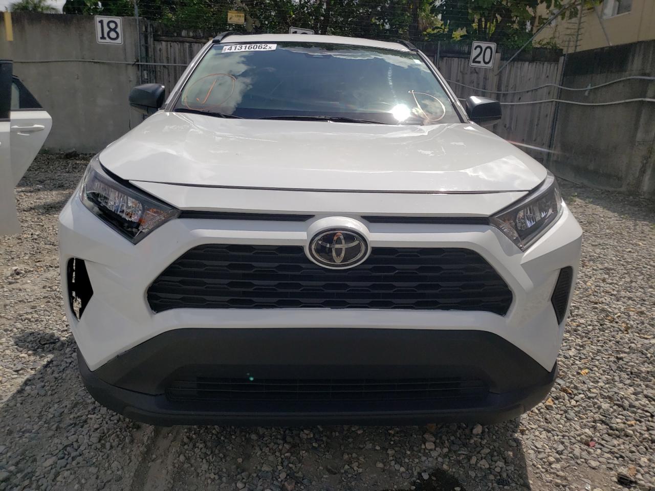 Photo 9 from auction – 2019 TOYOTA RAV4 LE with VIN 2T3H1RFV5KW038829