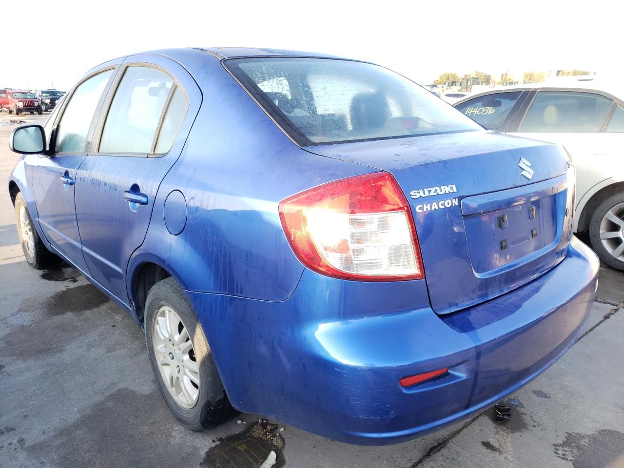 Photo 3 from auction – 2012 SUZUKI SX4 LE with VIN JS2YC5A3XC6302872