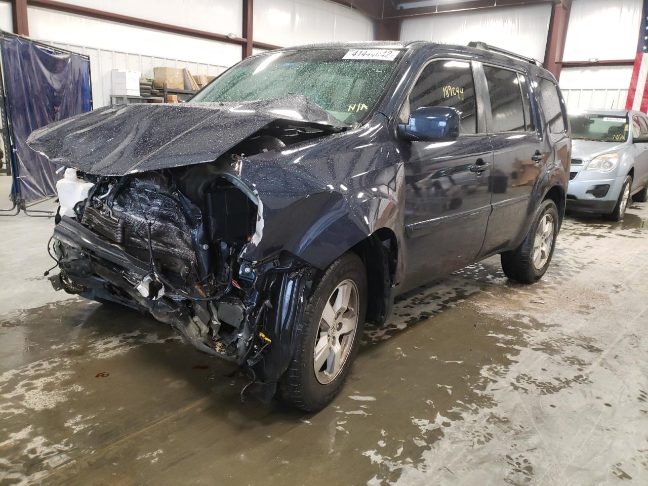 Photo 2 from auction – 2011 HONDA PILOT EXL with VIN 5FNYF3H58BB024442