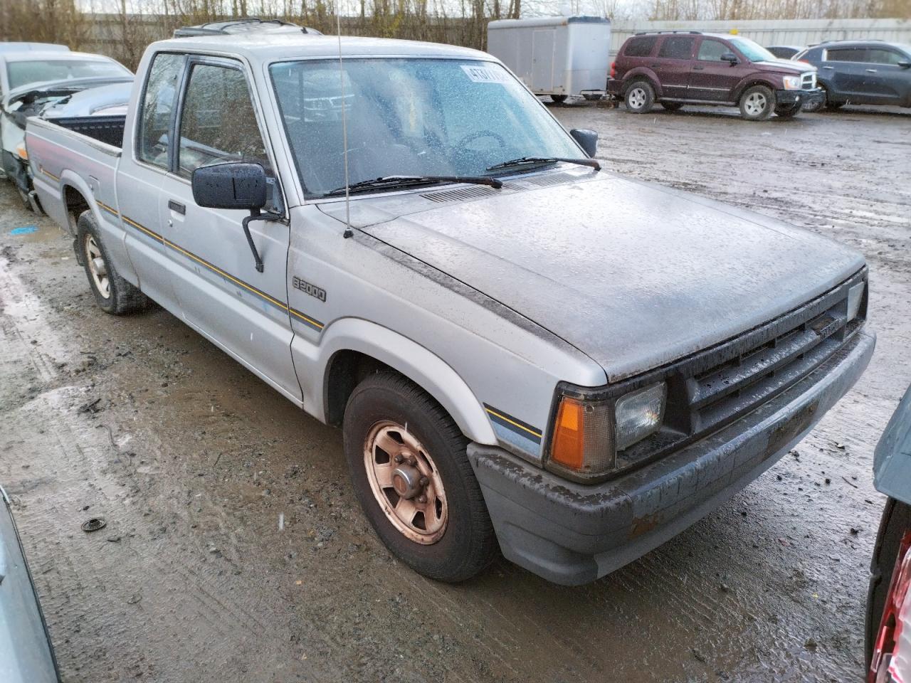 MAZDA B2000 CAB 1987 with VIN JM2UF3112H0505764 - Photo from auction