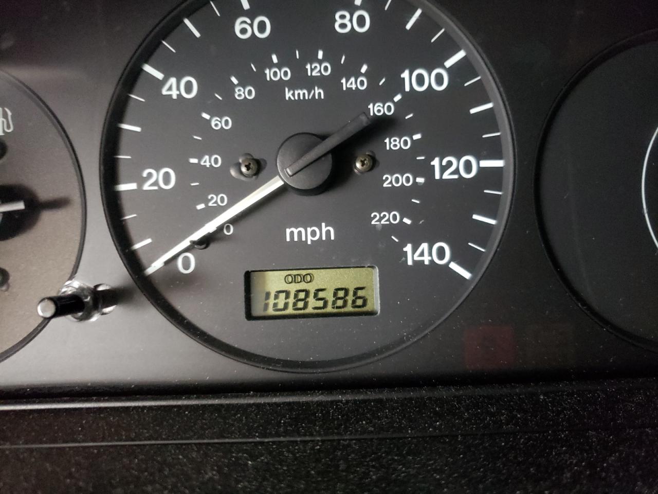 Photo 8 from auction – 1998 MAZDA PROTEGE DX with VIN JM1BC1410W0211619
