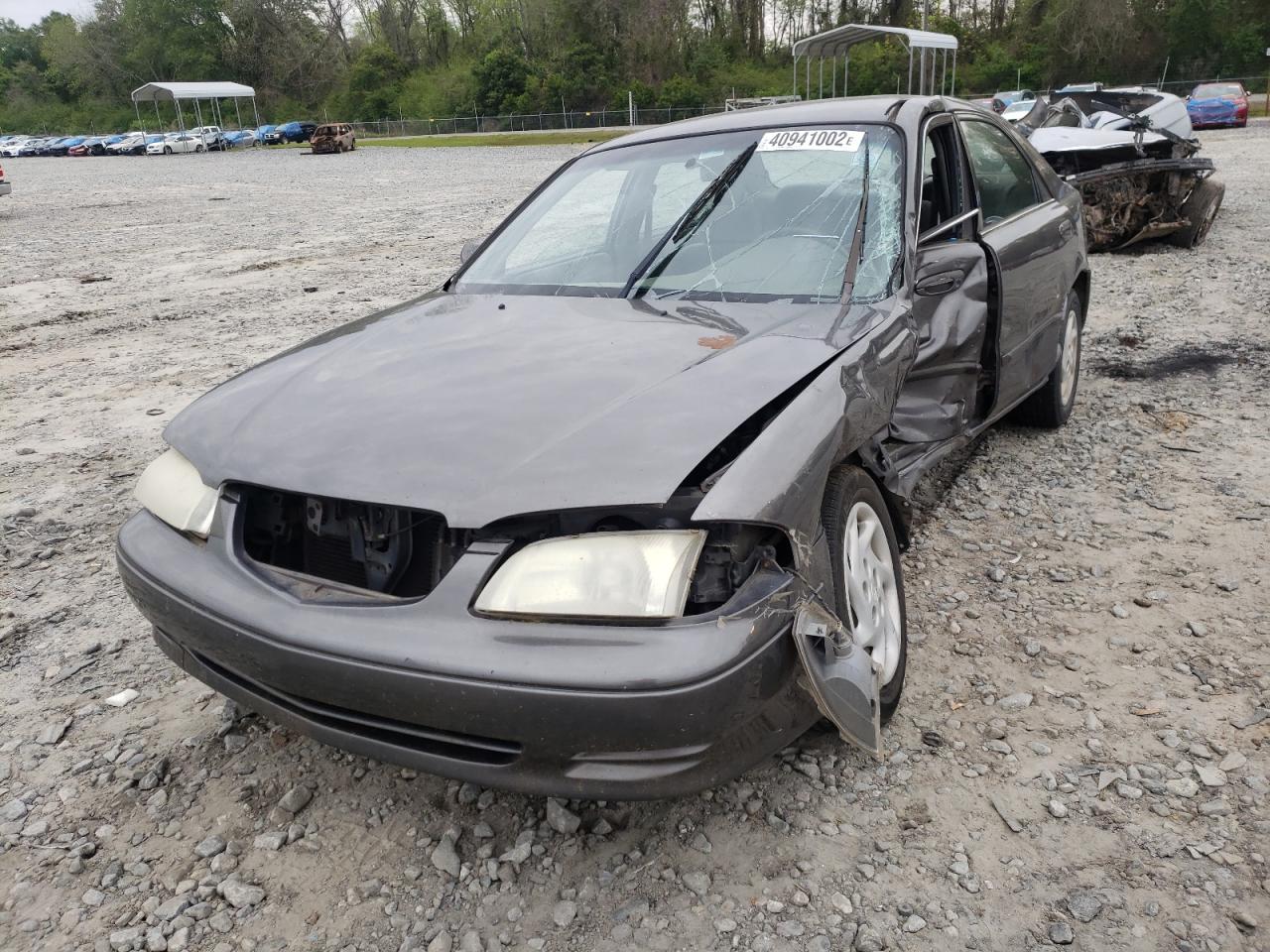 Photo 2 from auction – 2000 MAZDA 626 ES with VIN 1YVGF22C4Y5169897