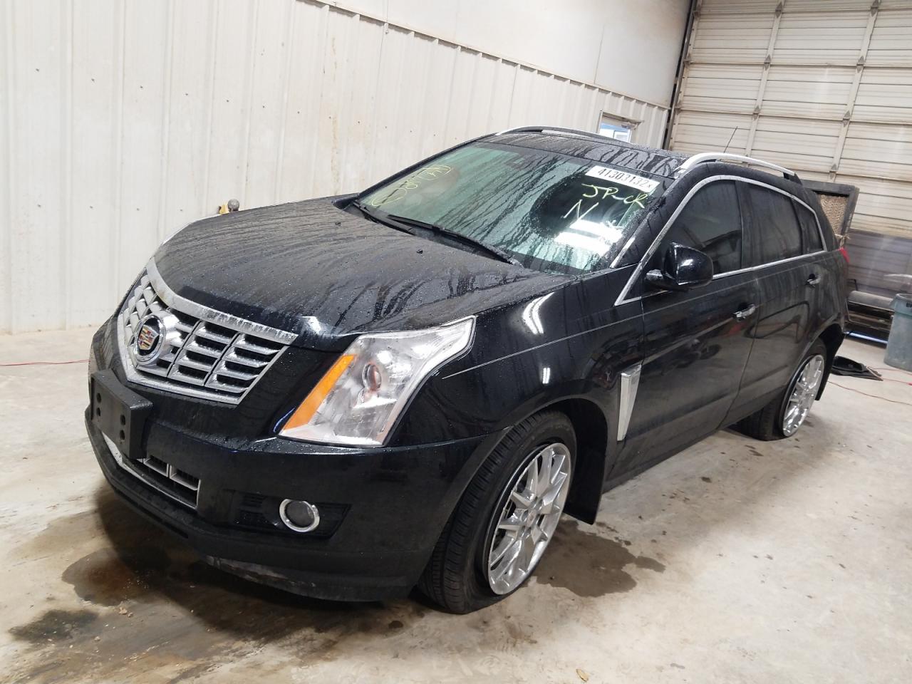 Photo 2 from auction – 2015 CADILLAC SRX PREMIU with VIN 3GYFNDE36FS520611