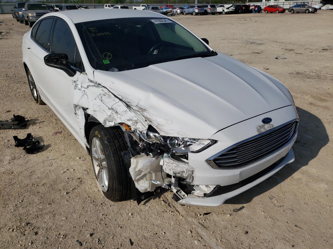 FORD FUSION SE 2018 with VIN 3FA6P0HD3JR210256 - Photo from auction