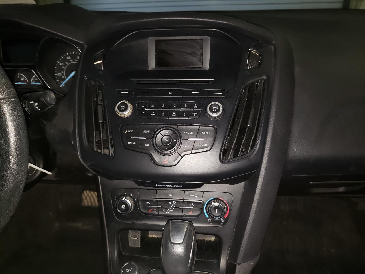 Photo 9 from auction – 2015 FORD FOCUS SE with VIN 1FADP3F20FL310721