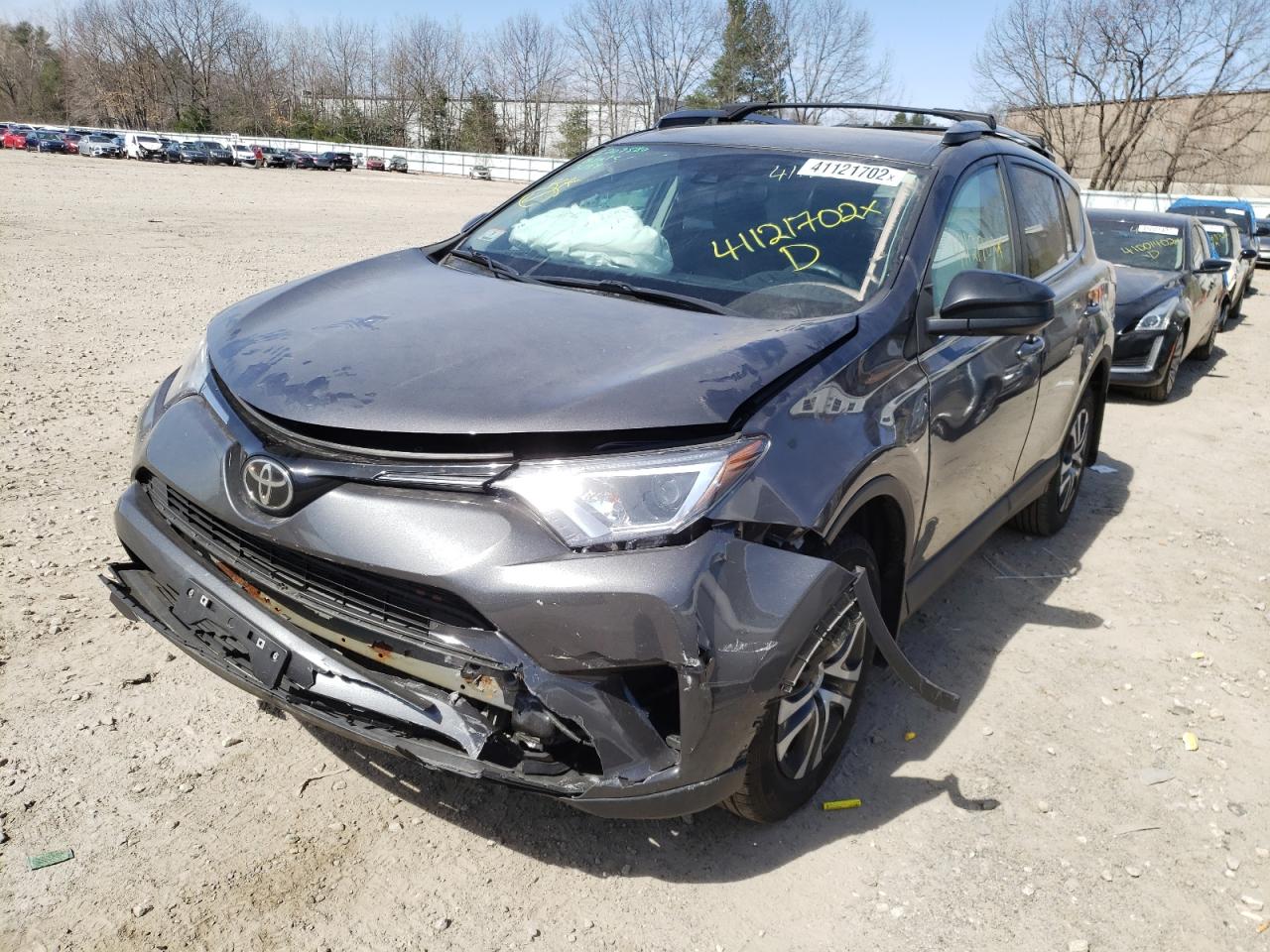 Photo 2 from auction – 2018 TOYOTA RAV4 LE with VIN 2T3BFREV9JW750865