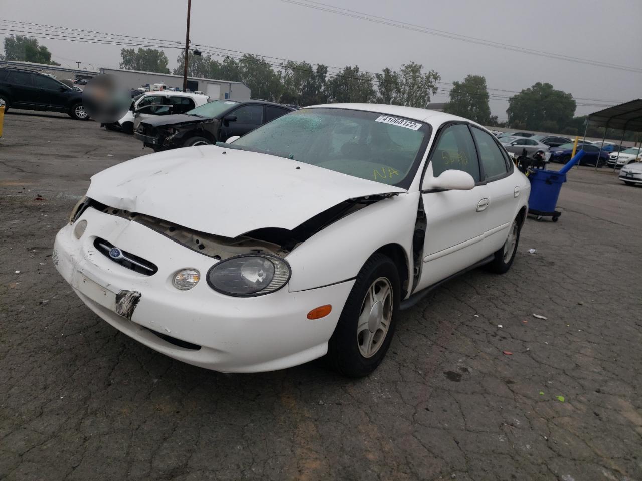 Photo 2 from auction – 1999 FORD TAURUS SE with VIN 1FAFP53U3XA271369