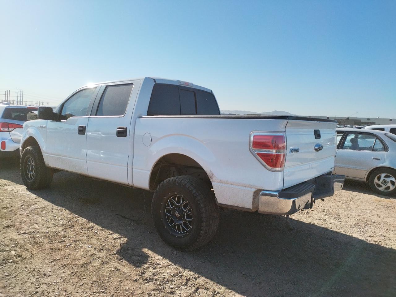 Photo 3 from auction – 2014 FORD F150 SUPER with VIN 1FTFW1EFXEFB02695