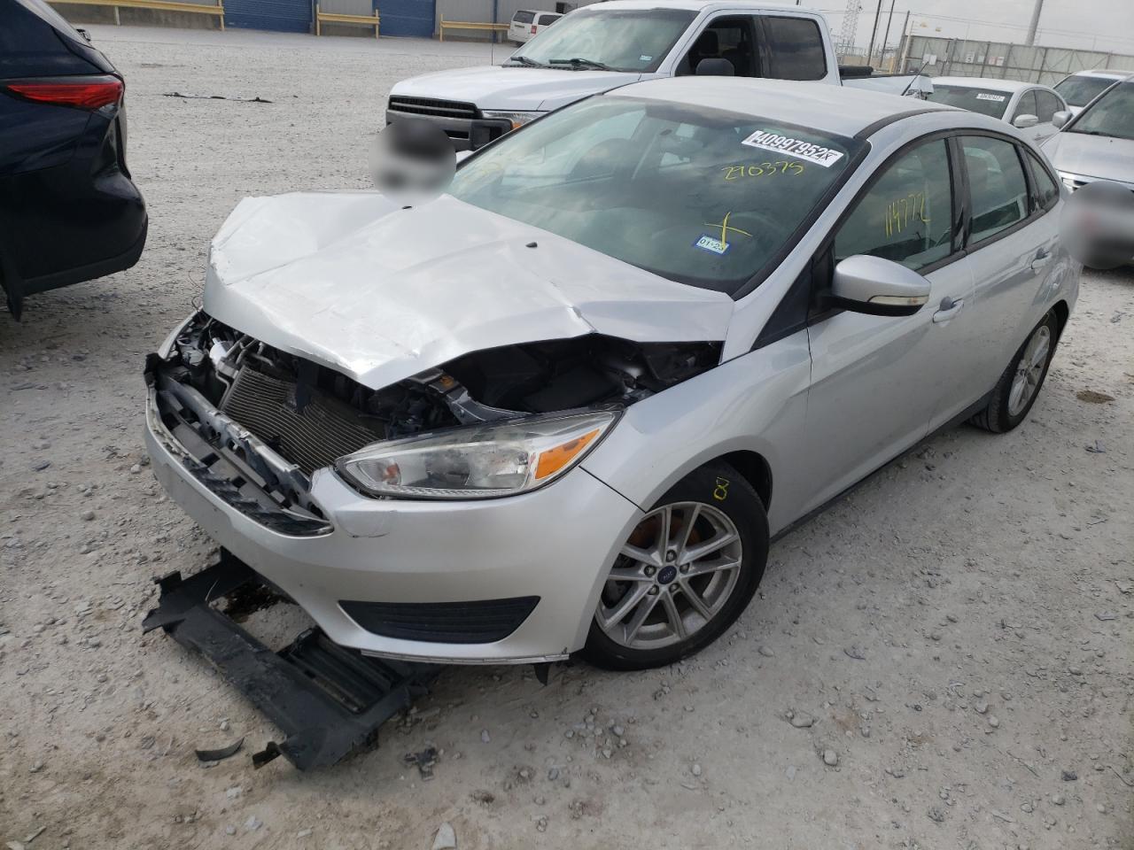 Photo 2 from auction – 2016 FORD FOCUS SE with VIN 1FADP3F22GL290375