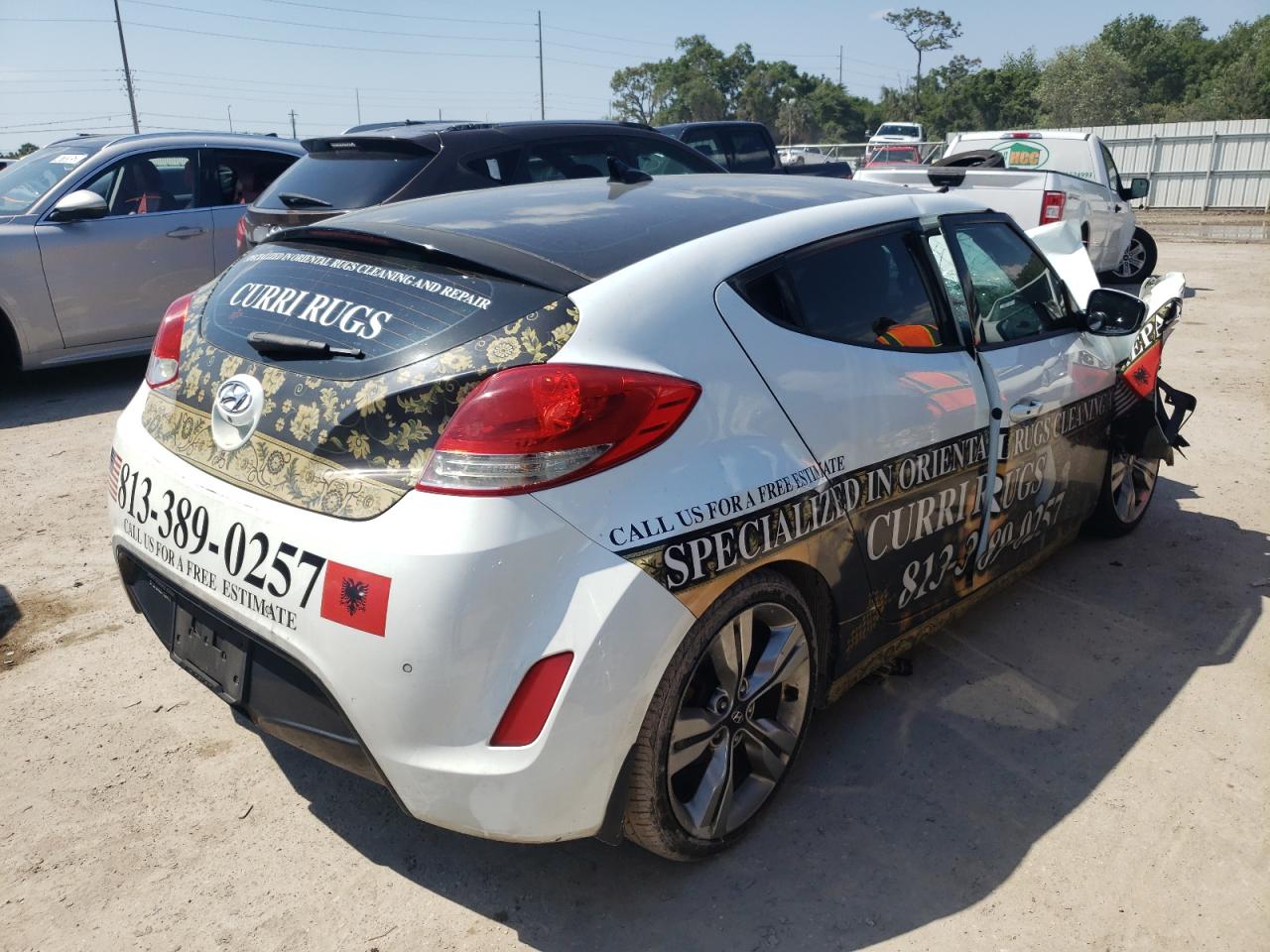 Photo 4 from auction – 2013 HYUNDAI VELOSTER with VIN KMHTC6AD5DU107497