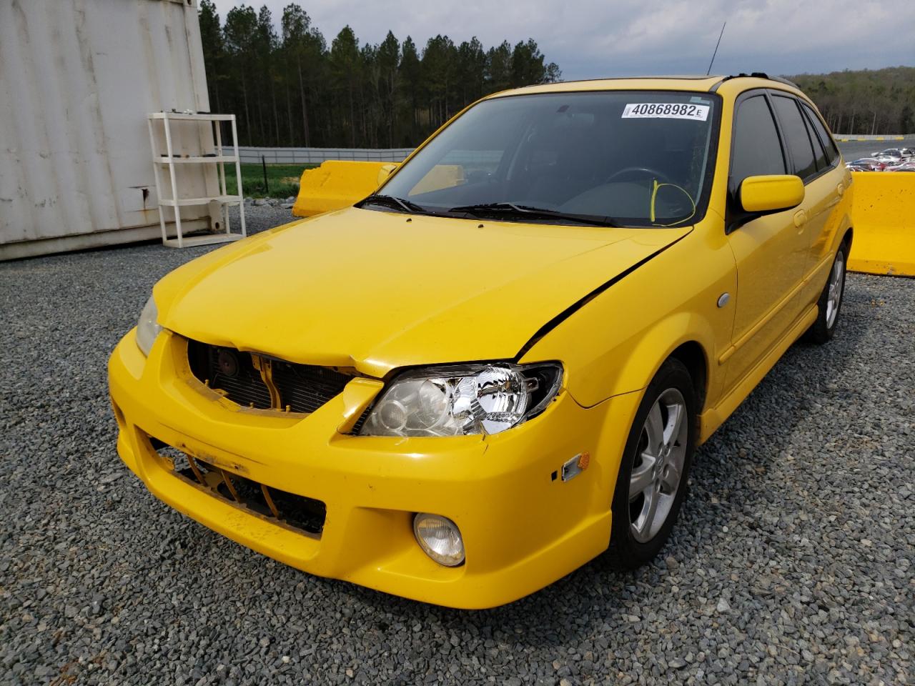 Photo 2 from auction – 2002 MAZDA PROTEGE PR with VIN JM1BJ245821635438