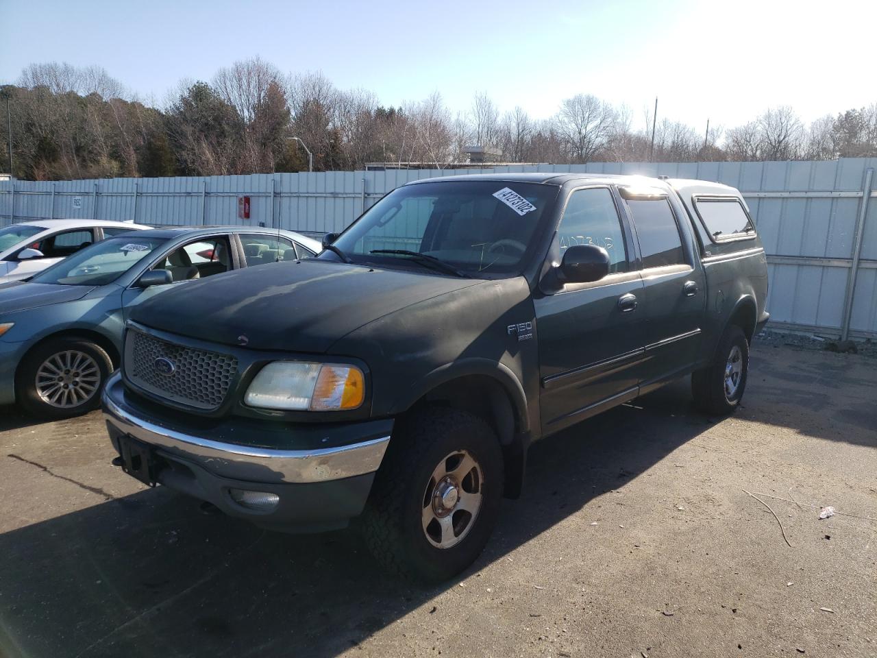 Photo 2 from auction – 2003 FORD F150 SUPER with VIN 1FTRW08653KB08833