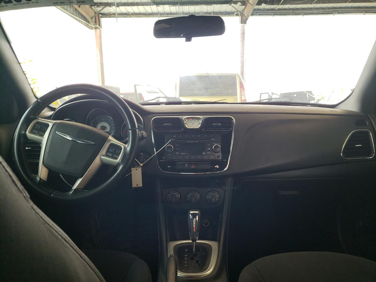 Photo 9 from auction – 2013 CHRYSLER 200 TOURIN with VIN 1C3CCBBG1DN569527