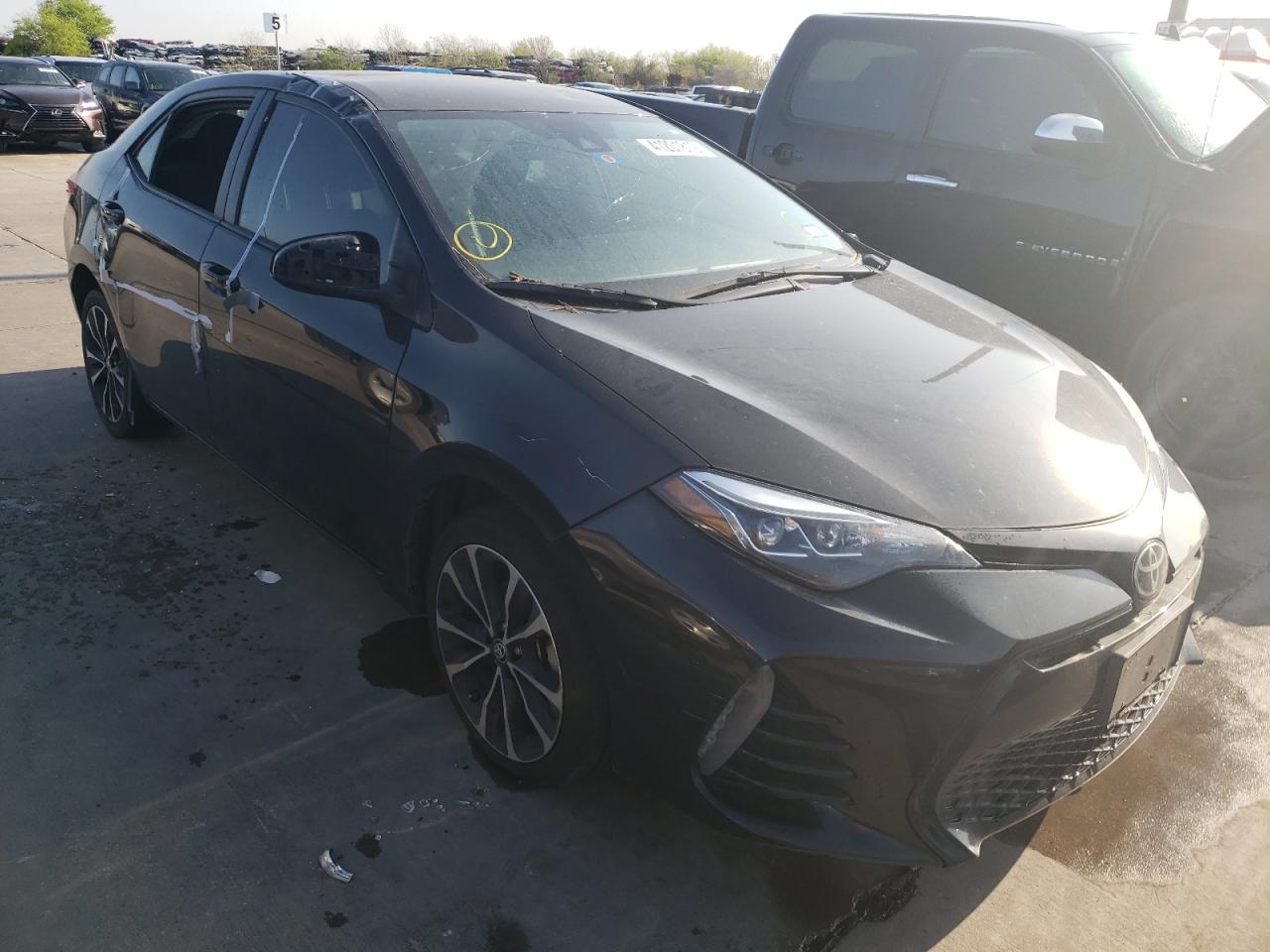 TOYOTA COROLLA L 2017 with VIN 5YFBURHE2HP735470 - Photo from auction