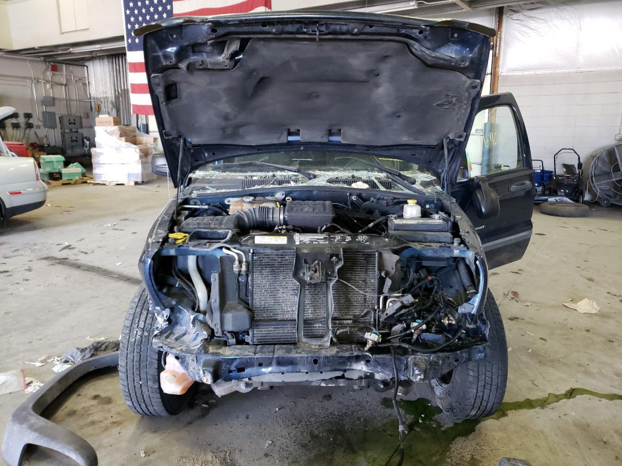 Photo 7 from auction – 2003 JEEP LIBERTY SP with VIN 1J4GL48K93W645826