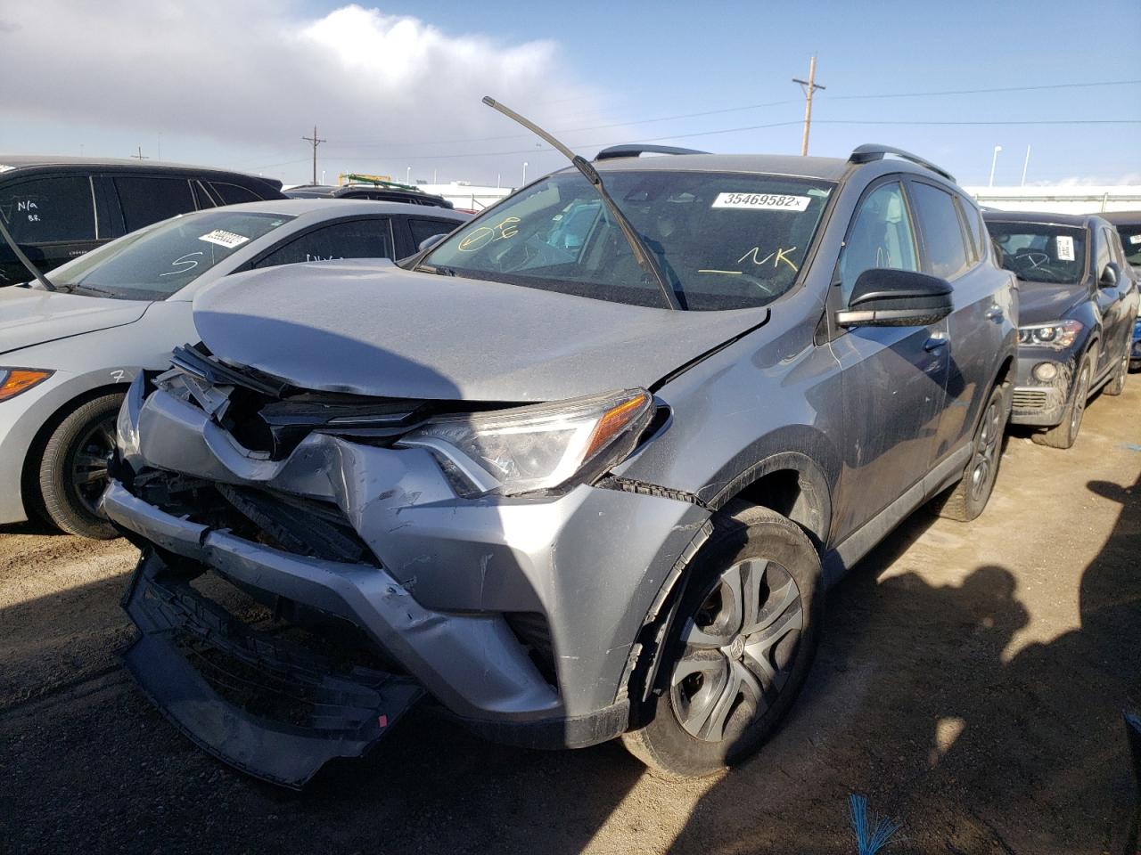 Photo 2 from auction – 2018 TOYOTA RAV4 LE with VIN 2T3BFREV8JW757368