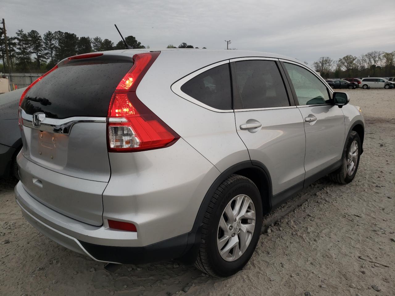 Photo 4 from auction – 2015 HONDA CR-V EX with VIN 2HKRM3H59FH522179