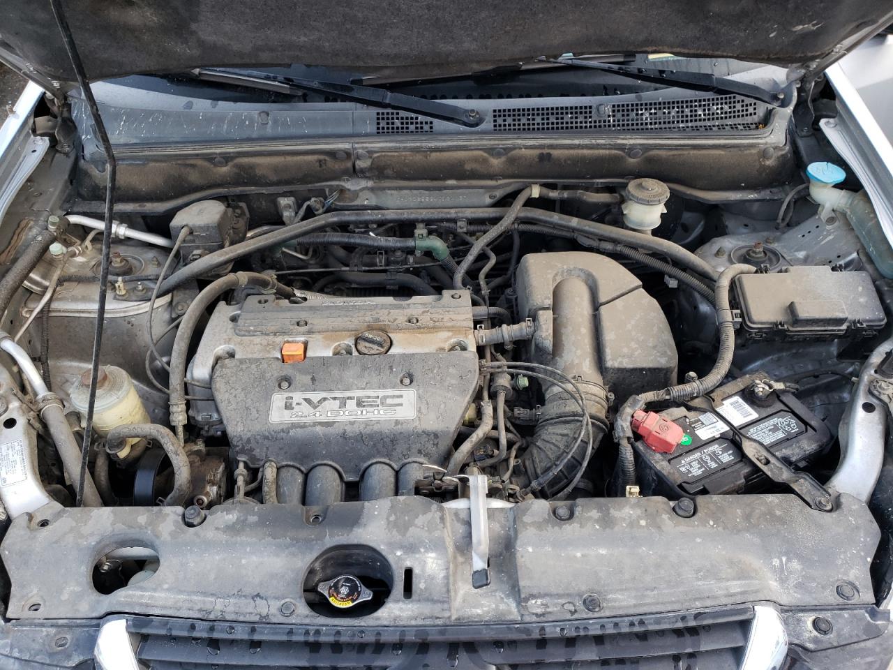 Photo 7 from auction – 2004 HONDA CR-V LX with VIN JHLRD68534C024167