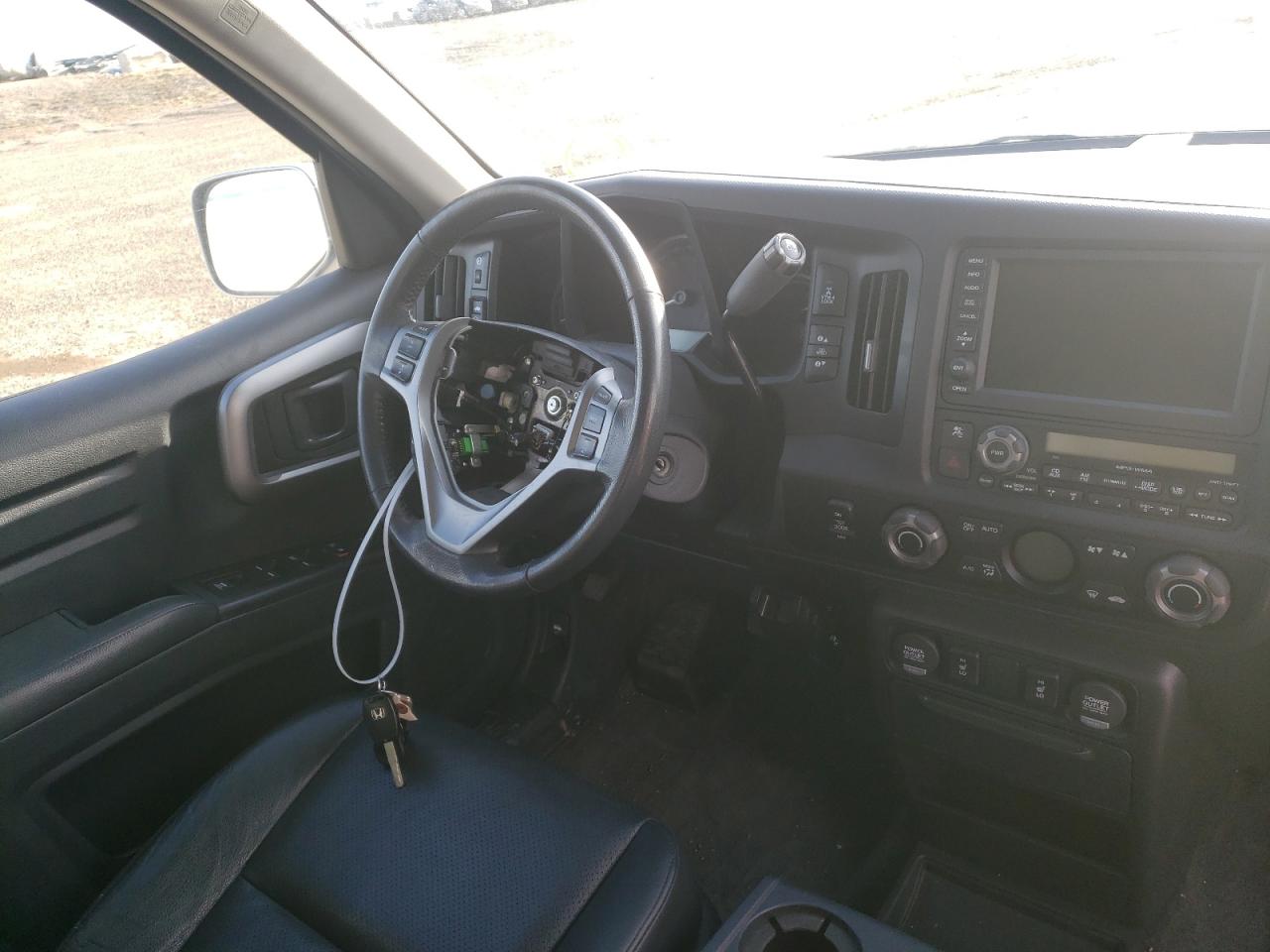 Photo 9 from auction – 2013 HONDA RIDGELINE with VIN 5FPYK1F59DB501926
