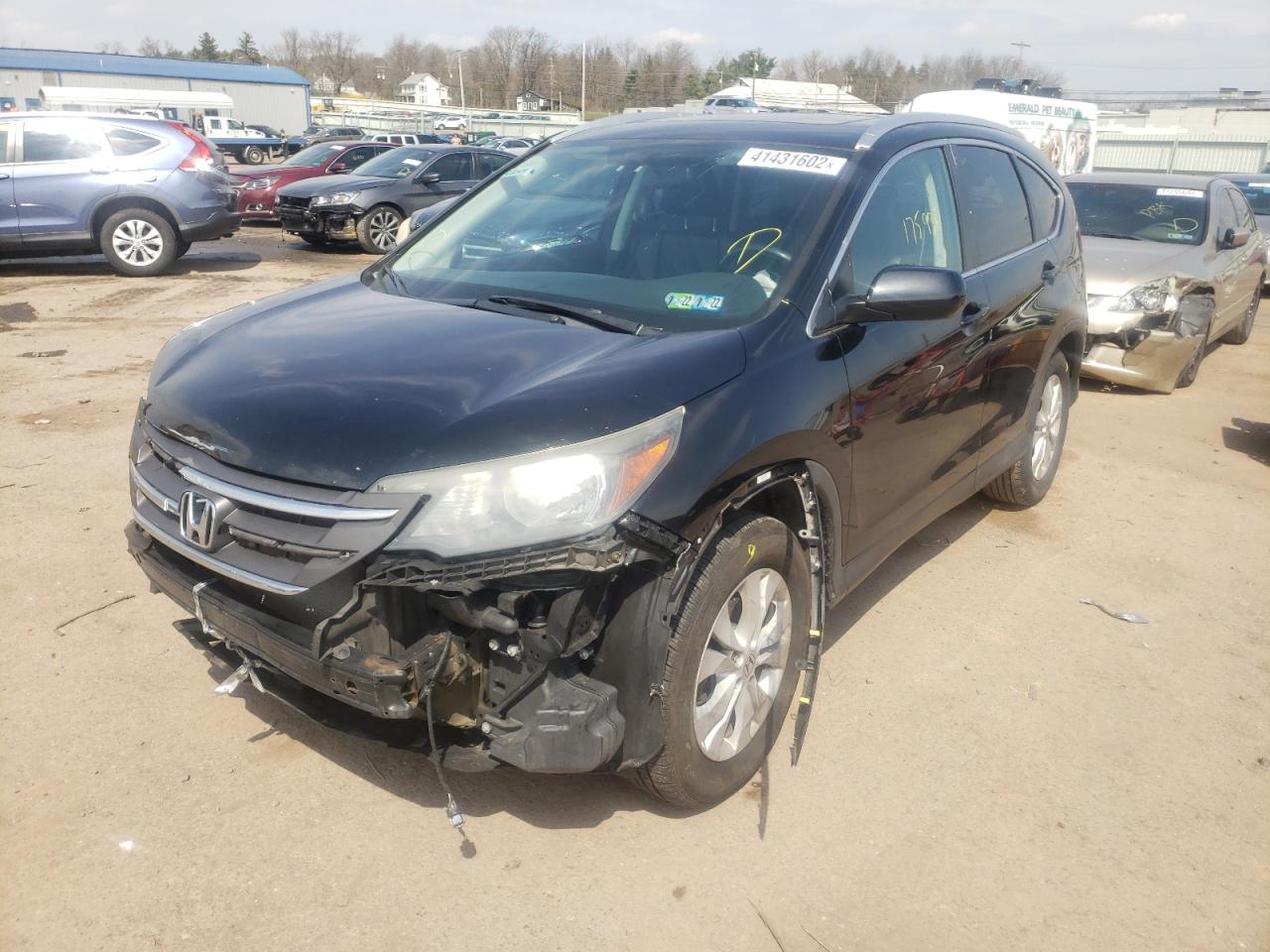 Photo 2 from auction – 2014 HONDA CR-V EXL with VIN 2HKRM4H79EH709556