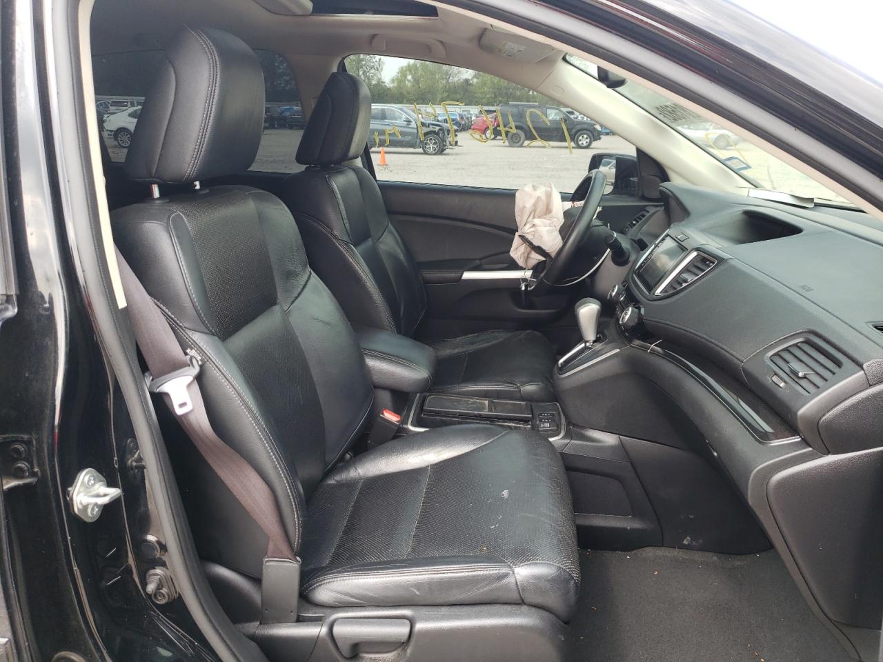 Photo 5 from auction – 2016 HONDA CR-V EXL with VIN 2HKRM3H75GH513370