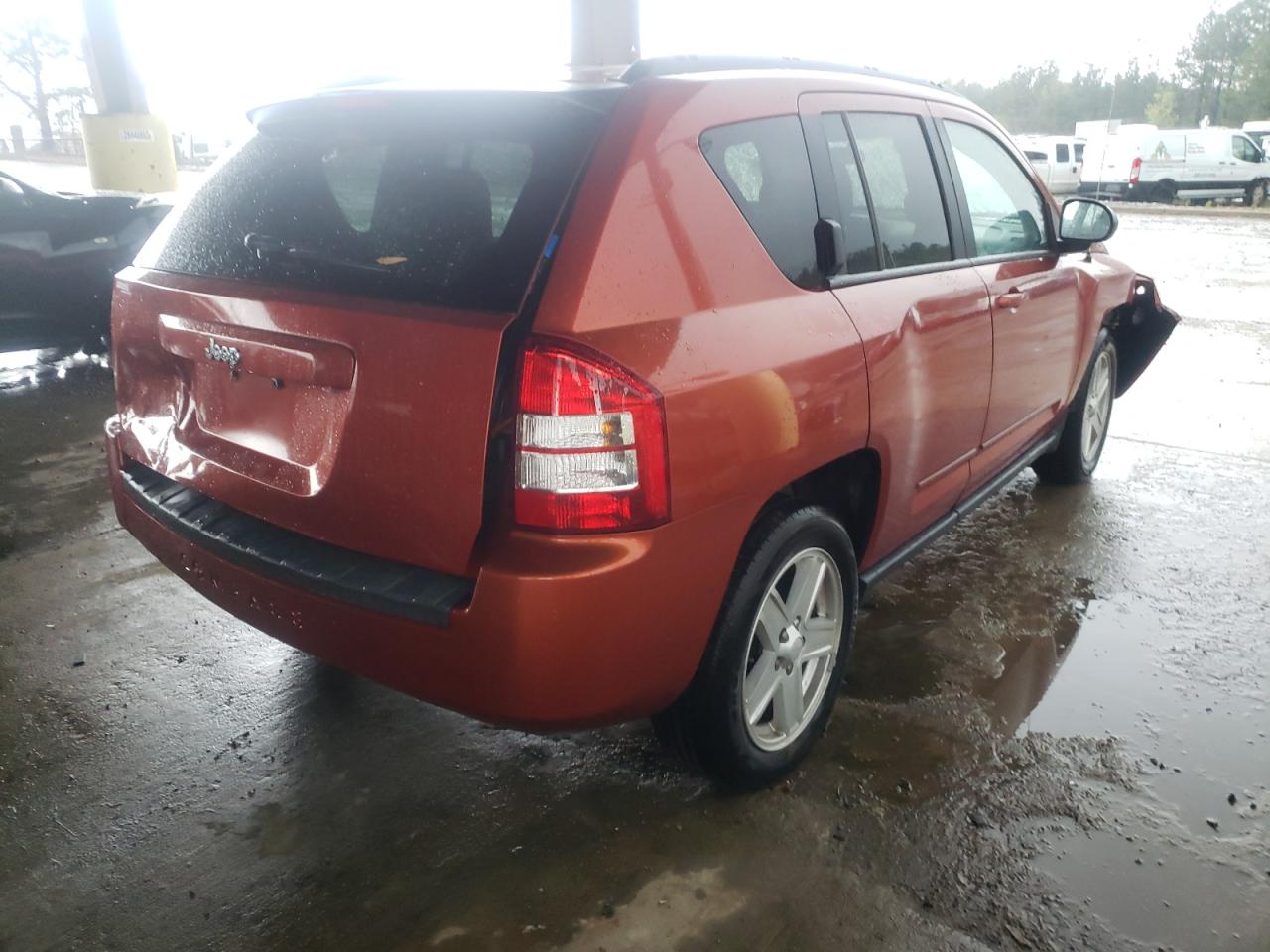 Photo 4 from auction – 2010 JEEP COMPASS SP with VIN 1J4NT4FB1AD549207