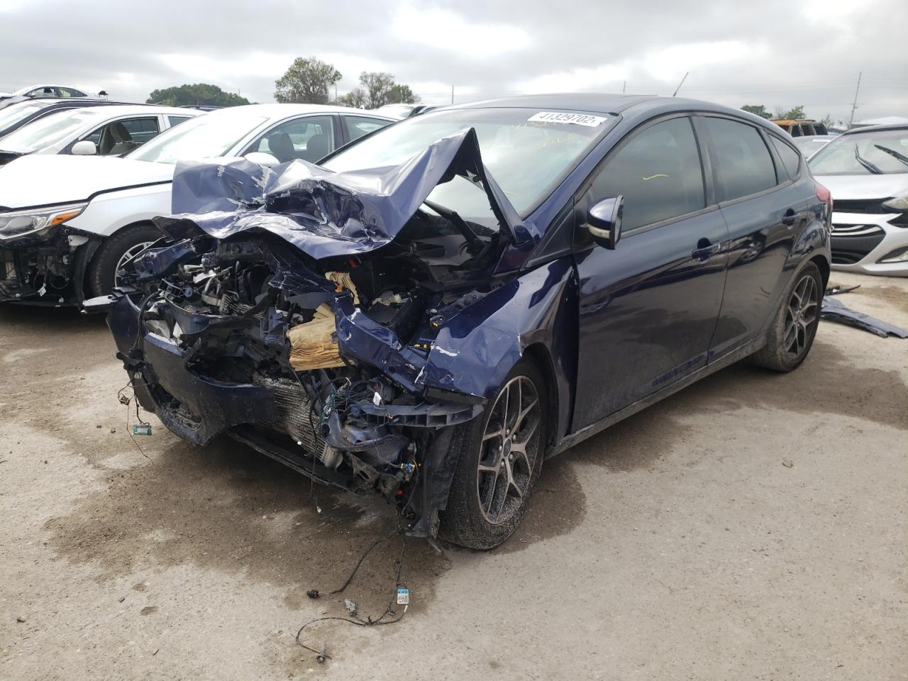 Photo 2 from auction – 2017 FORD FOCUS SEL with VIN 1FADP3M24HL312347