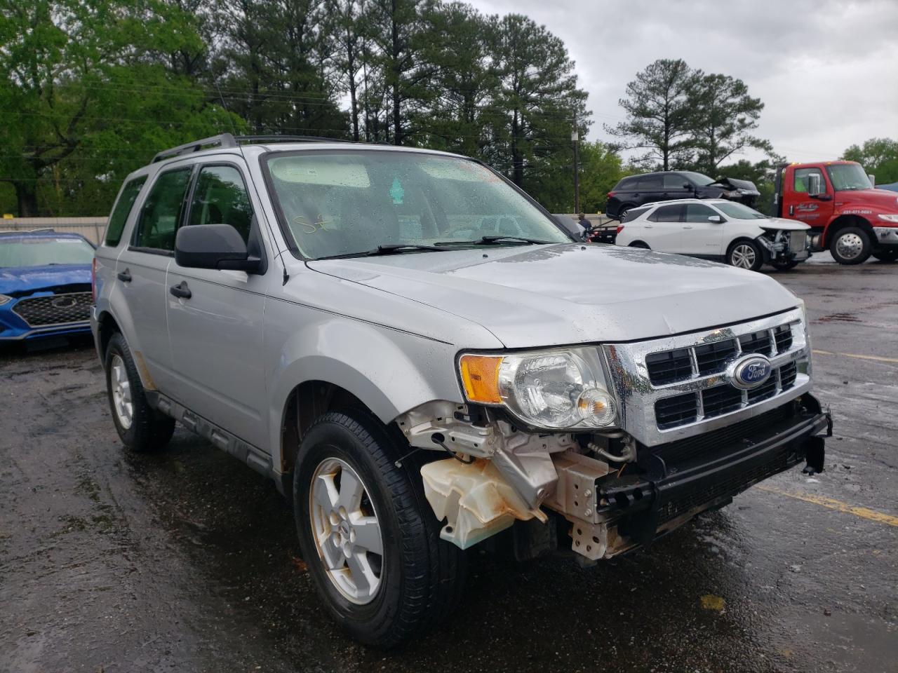 FORD ESCAPE XLS 2010 with VIN 1FMCU0C79AKB34470 - Photo from auction