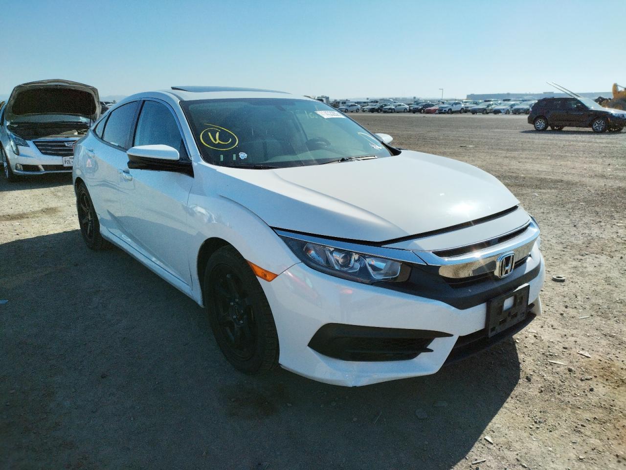 HONDA CIVIC EX 2016 con VIN 2HGFC2F73GH563665 - Foto de la subasta