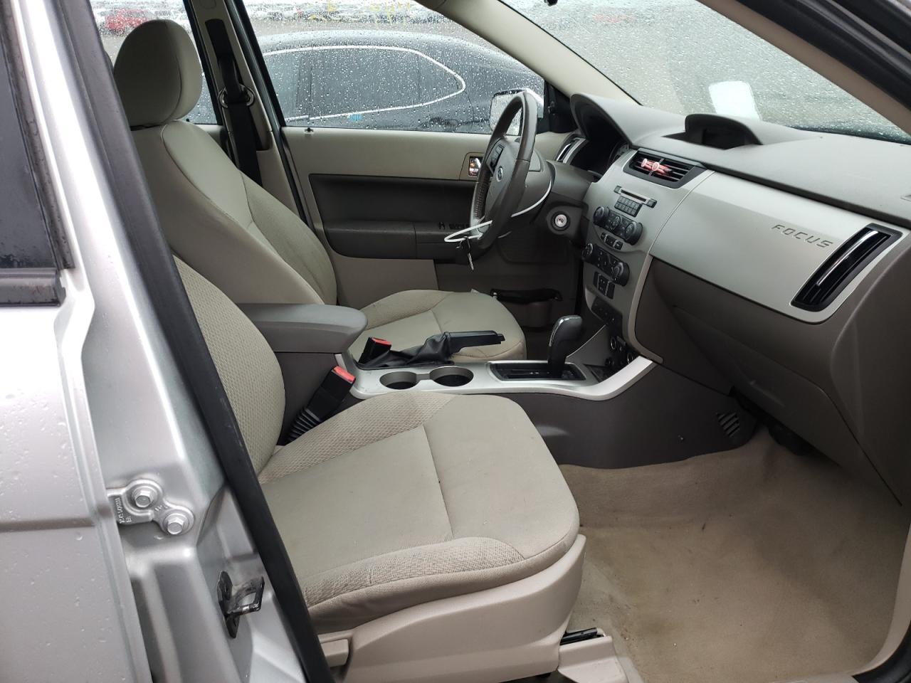 Photo 5 from auction – 2011 FORD FOCUS SES with VIN 1FAHP3GN8BW179640