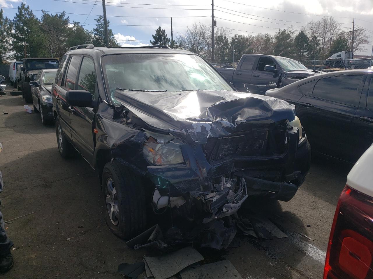 Photo 9 from auction – 2006 HONDA PILOT EX with VIN 2HKYF186X6H513025