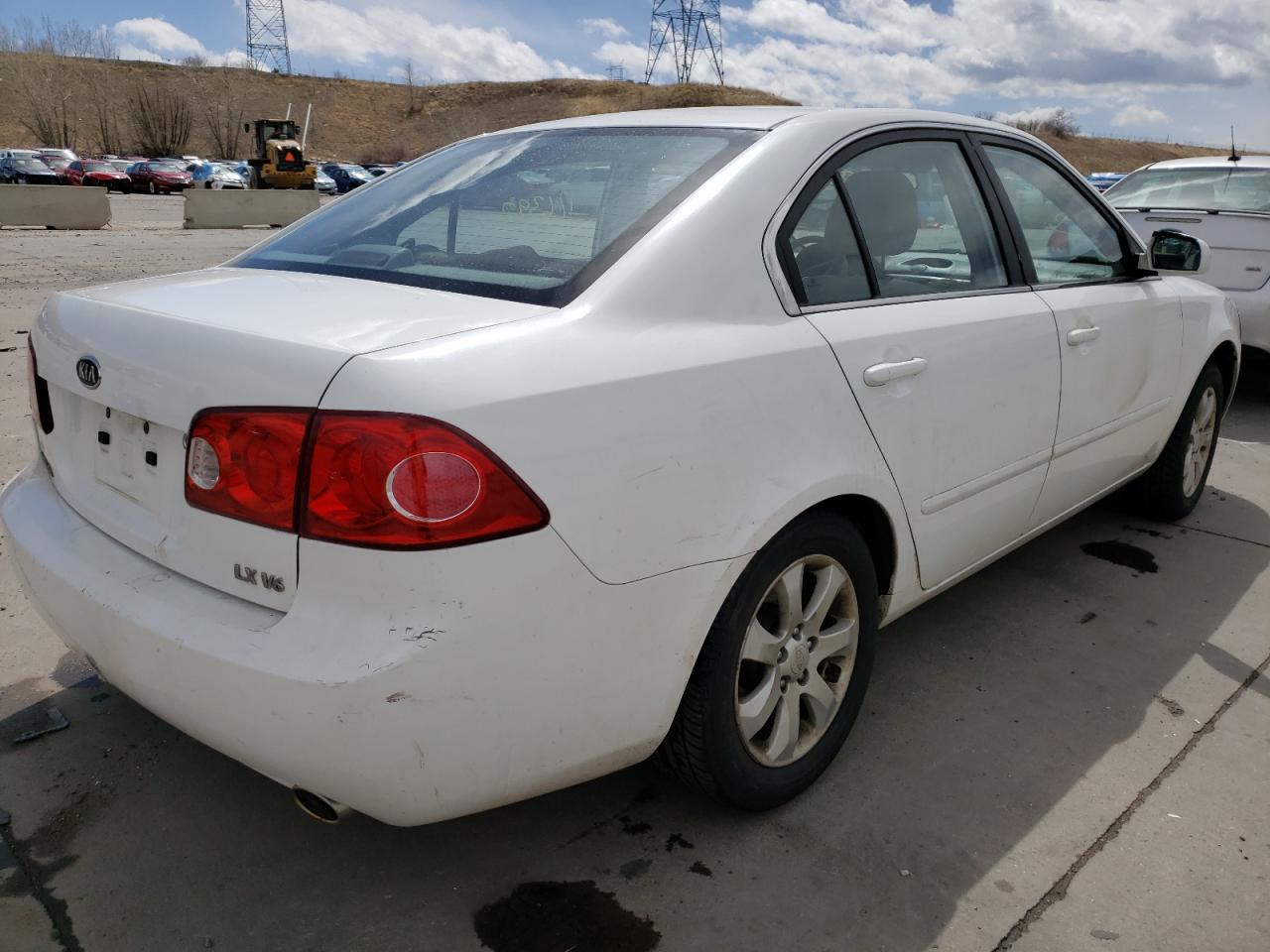 Photo 4 from auction – 2006 KIA OPTIMA LX with VIN KNAGE124465035557