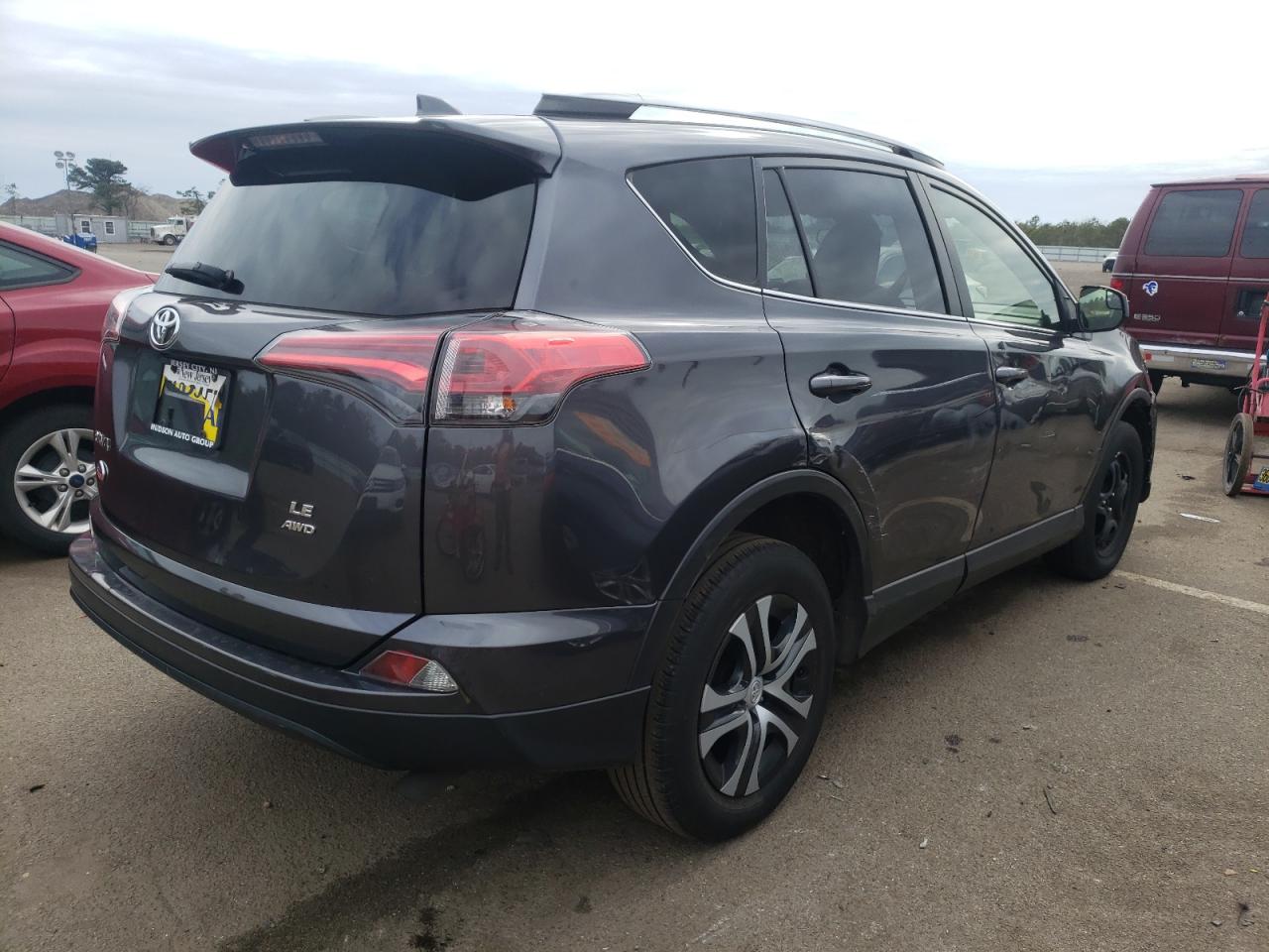 Photo 4 from auction – 2018 TOYOTA RAV4 LE with VIN JTMBFREV9JJ222807