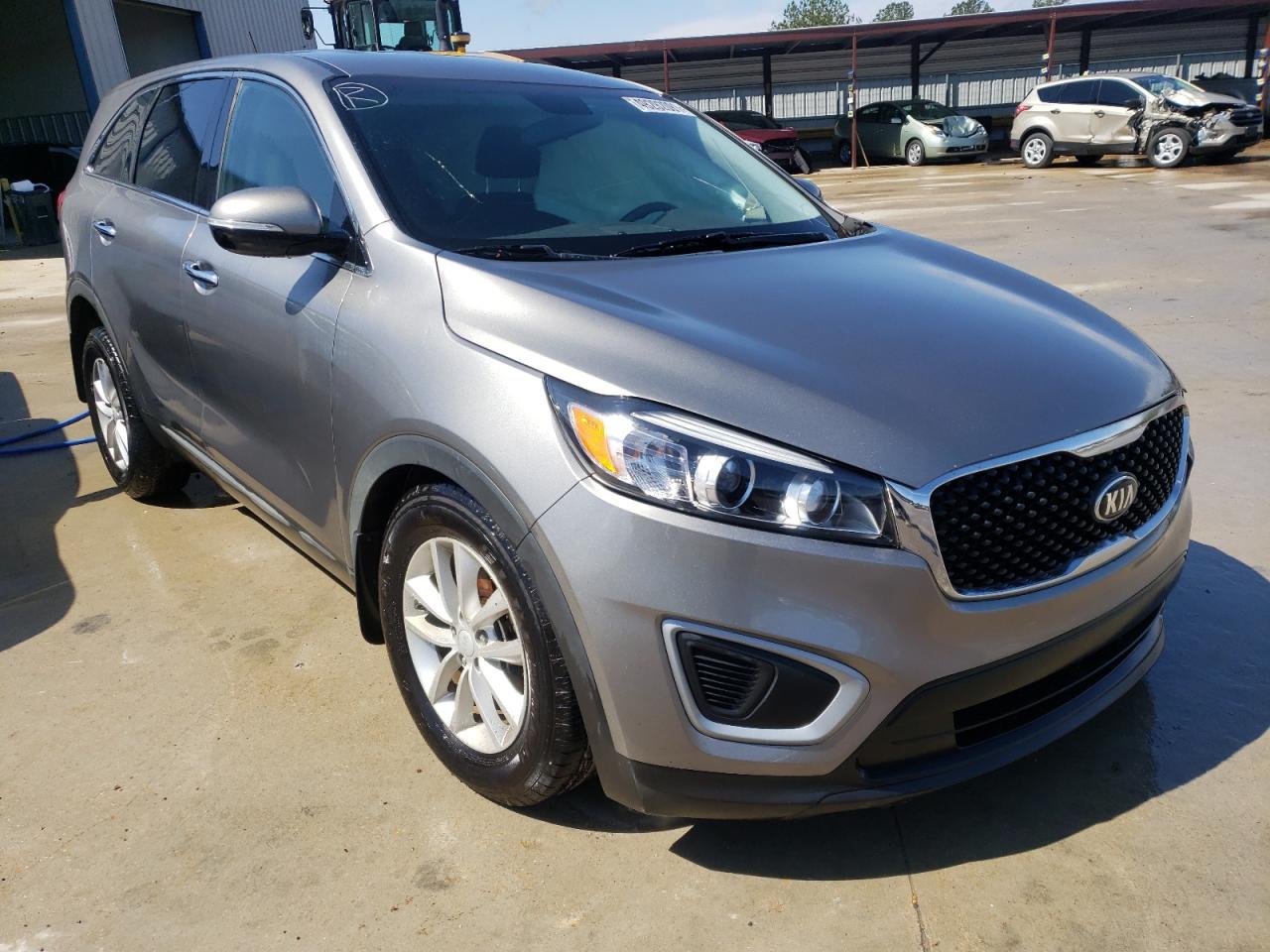 KIA SORENTO LX 2018 with VIN 5XYPG4A36JG424580 - Photo from auction