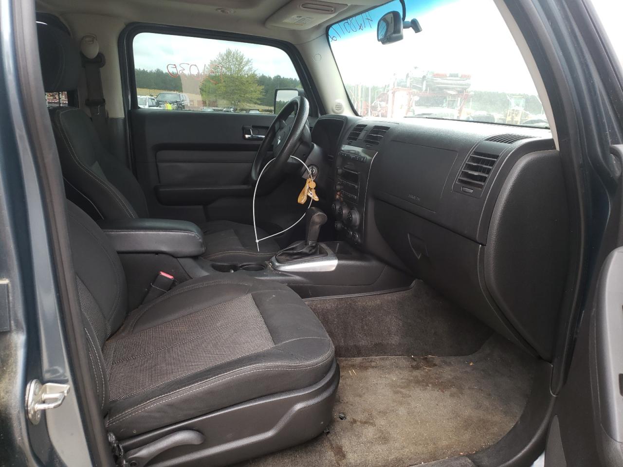 Photo 5 from auction – 2007 HUMMER H3 with VIN 5GTDN13E978207250