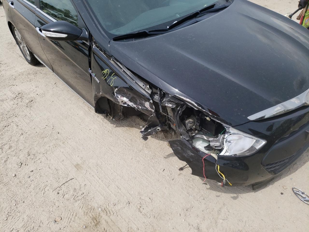Photo 9 from auction – 2014 HYUNDAI SONATA HYB with VIN KMHEC4A44EA109547