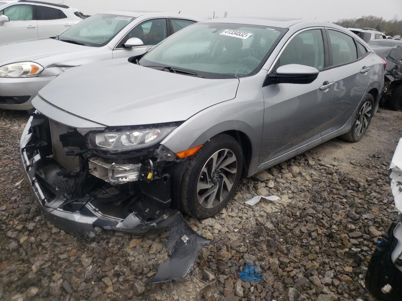Photo 2 from auction – 2018 HONDA CIVIC EX with VIN 19XFC2F75JE041279