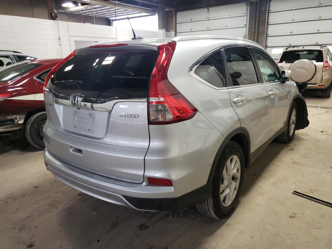 Foto 4 de la subasta – 2016 HONDA CR-V con VIN 5J6RM4H71GL135205