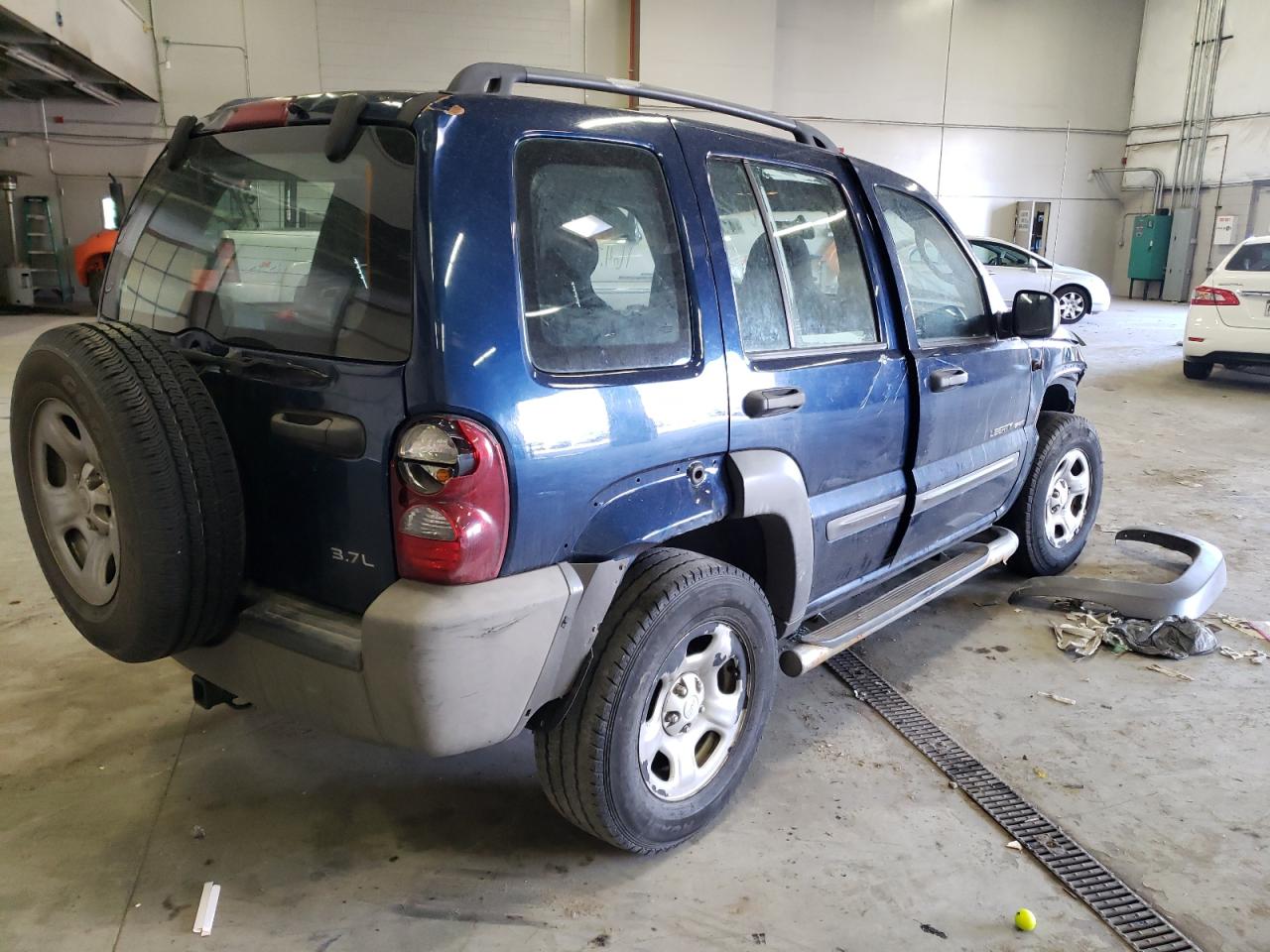 Photo 4 from auction – 2003 JEEP LIBERTY SP with VIN 1J4GL48K93W645826