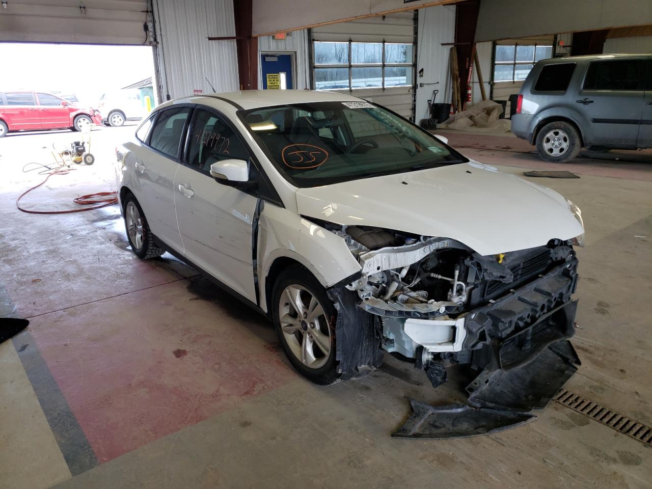 FORD FOCUS SE 2014 with VIN 1FADP3F2XEL428046 - Photo from auction