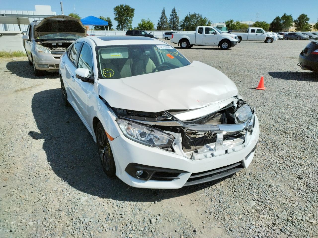 HONDA CIVIC EXL 2017 with VIN 19XFC1F73HE200238 - Photo from auction