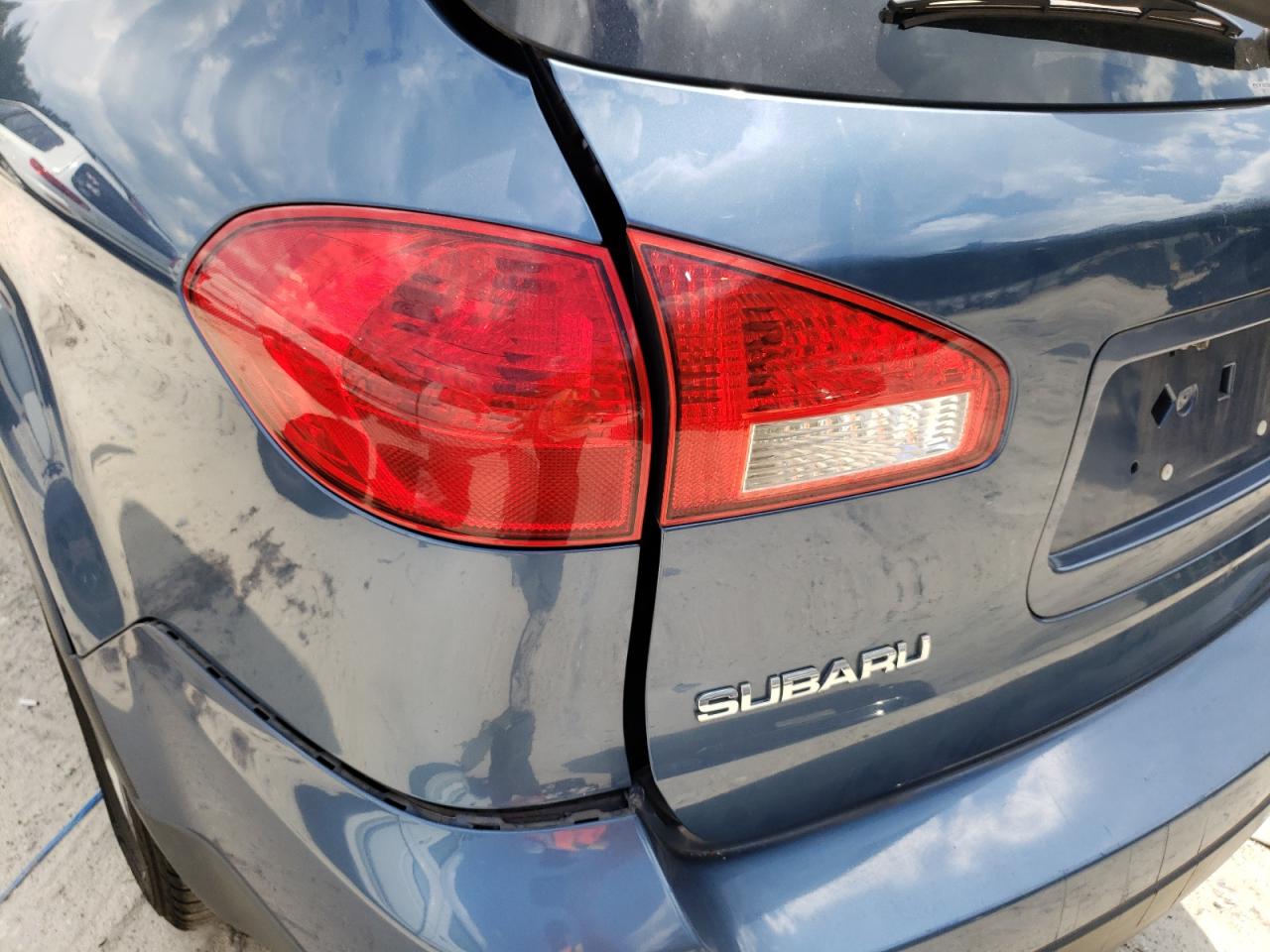 Photo 10 from auction – 2009 SUBARU TRIBECA LI with VIN 4S4WX97D994403348