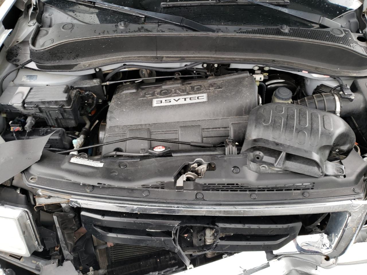 Photo 7 from auction – 2010 HONDA RIDGELINE with VIN 5FPYK1F26AB006374