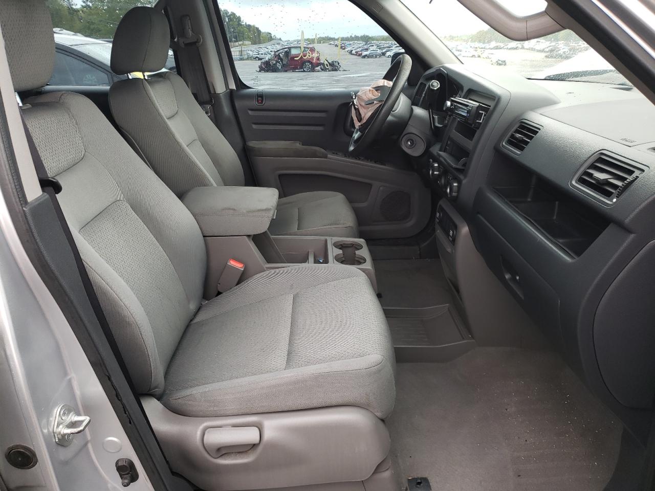 Photo 5 from auction – 2010 HONDA RIDGELINE with VIN 5FPYK1F26AB006374