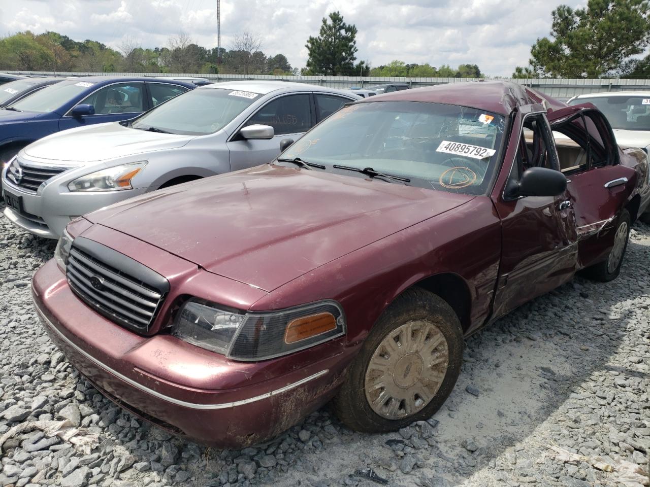 Photo 2 from auction – 2004 FORD CROWN VICT with VIN 2FAFP71W64X106239