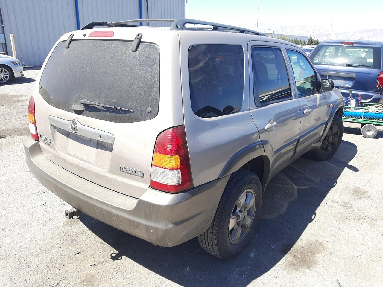 Photo 4 from auction – 2002 MAZDA TRIBUTE LX with VIN 4F2YU09132KM19762