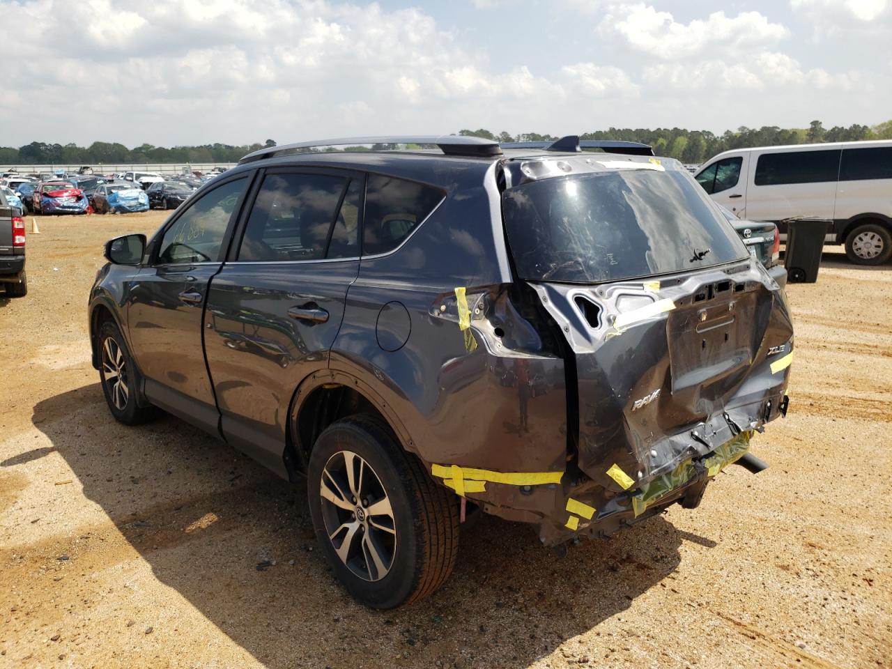 Photo 3 from auction – 2017 TOYOTA RAV4 XLE with VIN JTMWFREV2HD102129