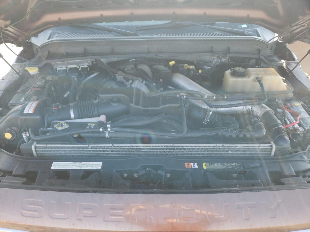 Photo 7 from auction – 2012 FORD F250 SUPER with VIN 1FT7W2BT2CEA79159