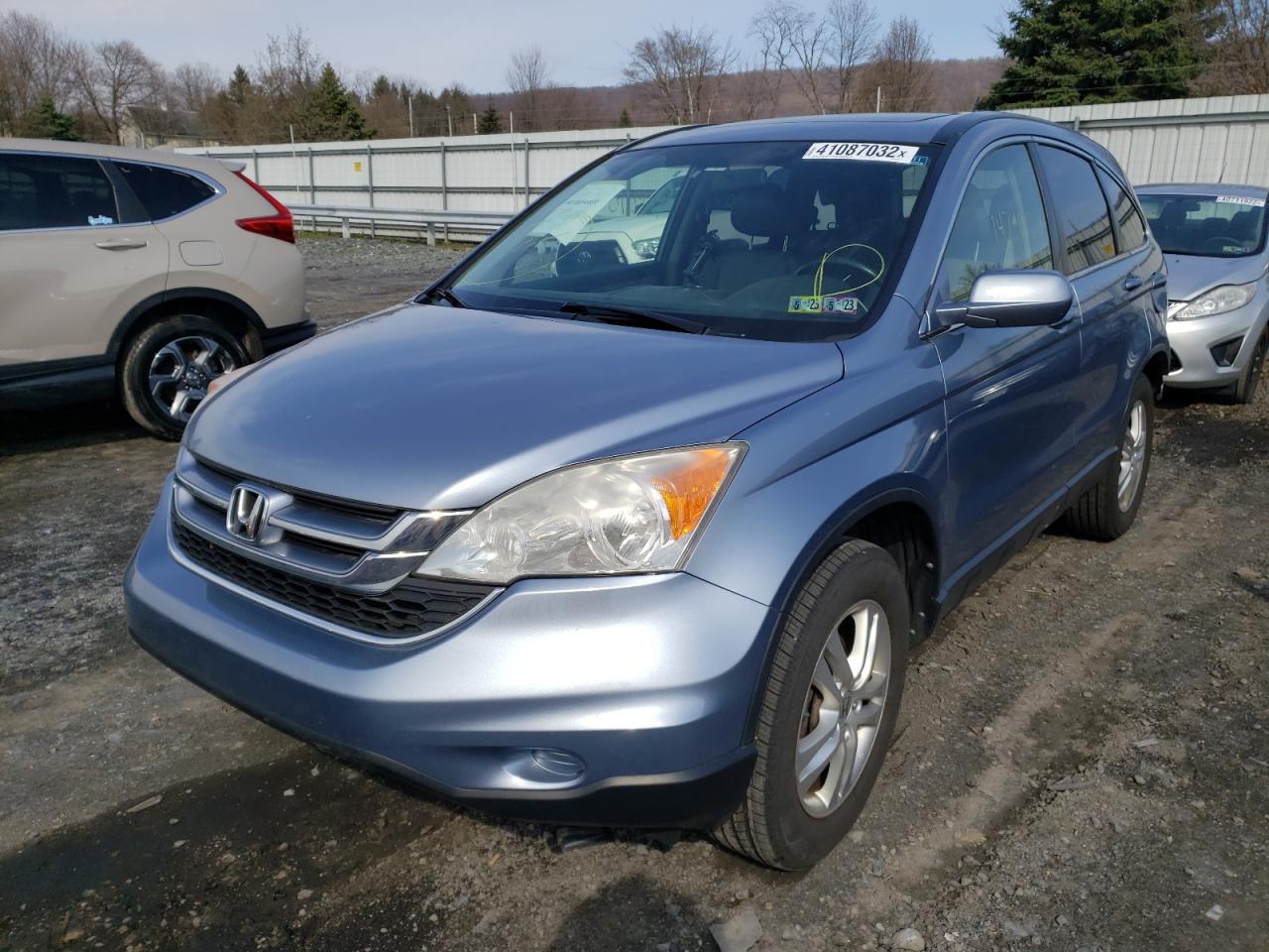 Photo 2 from auction – 2011 HONDA CR-V EXL with VIN JHLRE4H71BC021414