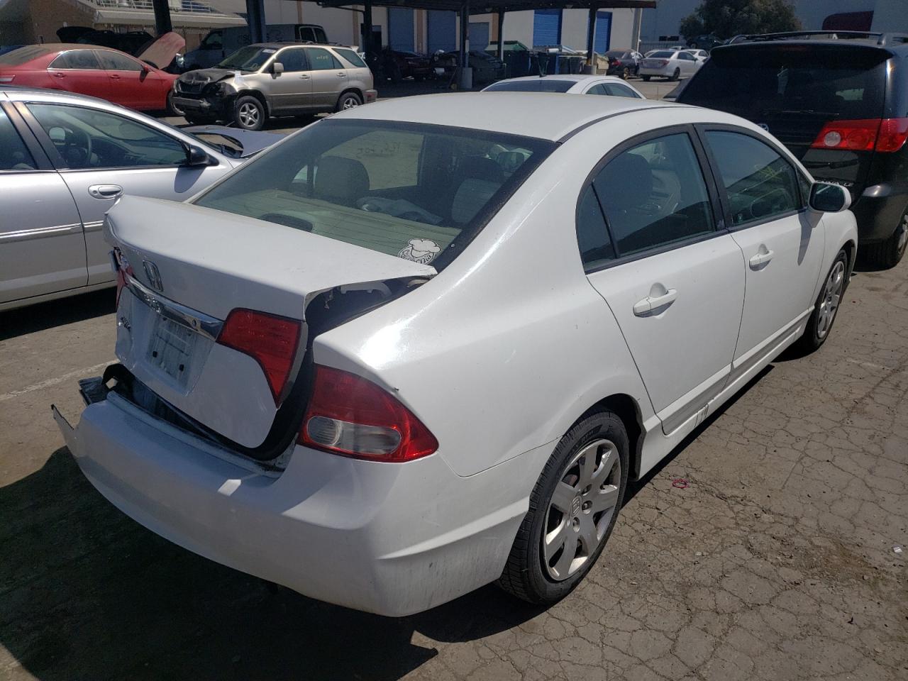 Photo 4 from auction – 2010 HONDA CIVIC LX with VIN 19XFA1F57AE051049